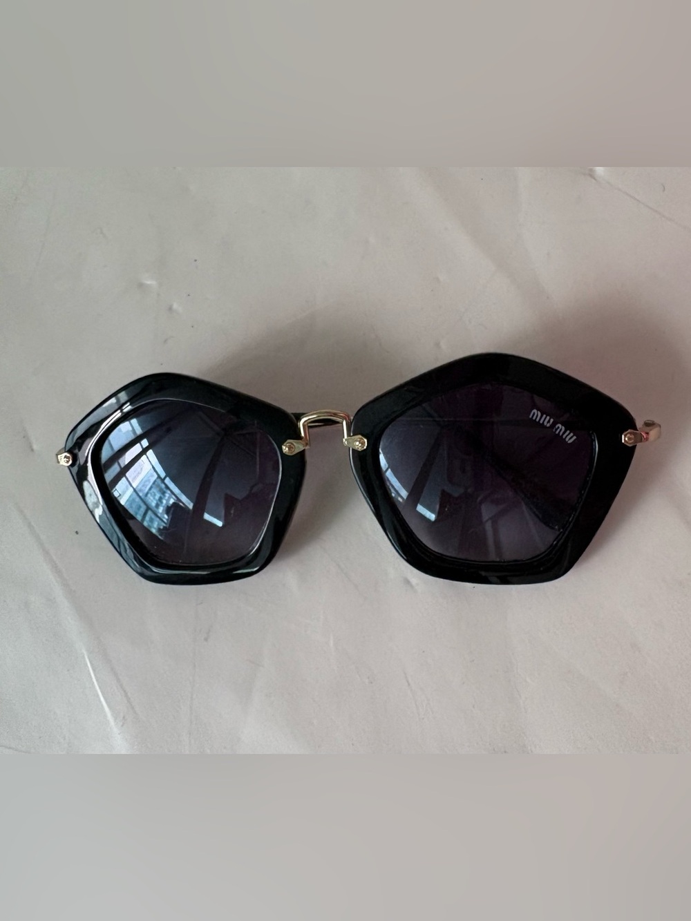 MIU MIU Glossy Black Pentagonal Sunglasses MU 06O 1AB-1A1 06OS